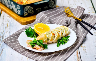 Squid stuffed with rice and egg with sour cream in the oven