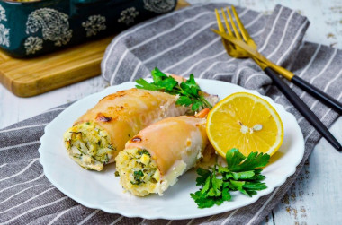 Squid stuffed with rice and egg with sour cream in the oven