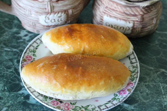 Pies with cabbage and egg from yeast dough