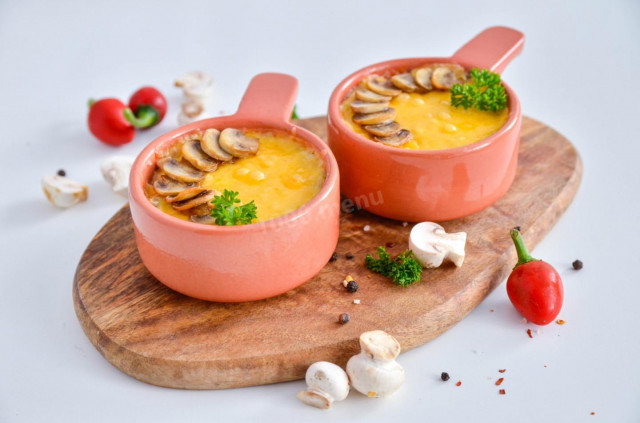 Julienne with chicken and mushrooms with cream in the oven