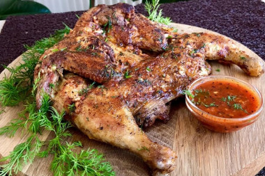 Chicken gherkins in a frying pan