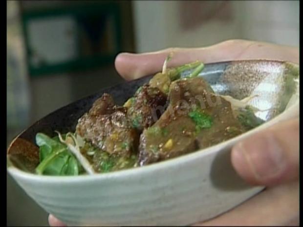 Meat stew with orange juice and ginger