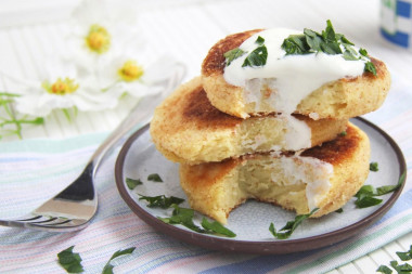 Mashed potato patties in a frying pan