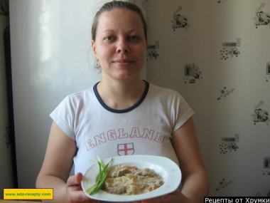 Sauerkraut stew with pork and sour cream in a saucepan