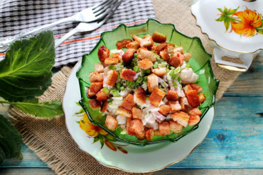 Salad with beans, cakes and sausage