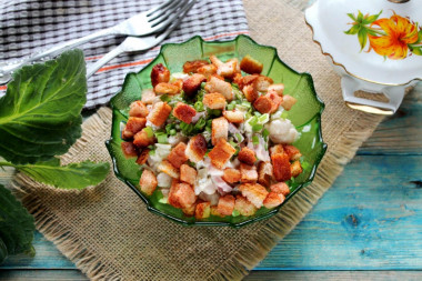 Salad with beans, cakes and sausage