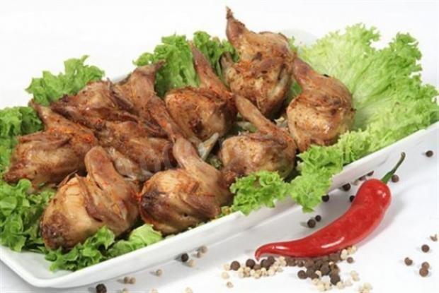 Quail meat in tkemali sauce