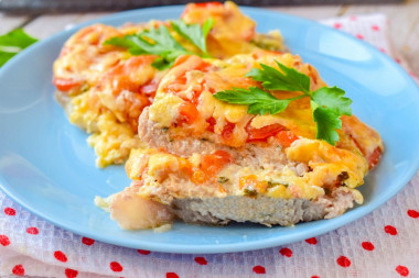 Pork in the oven with cheese and tomatoes