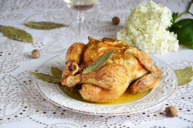 Chicken with garlic in the oven with a golden crust