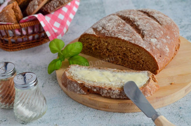 Black bread made from rye and wheat flour in the oven