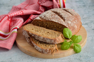 Black bread made from rye and wheat flour in the oven