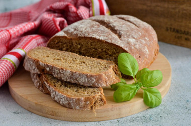 Black bread made from rye and wheat flour in the oven