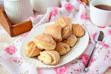 Cottage cheese cookies triangles with sugar in the oven