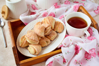 Cottage cheese cookies triangles with sugar in the oven