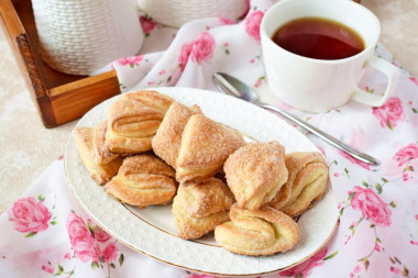 Cottage cheese cookies triangles with sugar in the oven