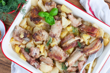 Pork ribs with potatoes in the oven