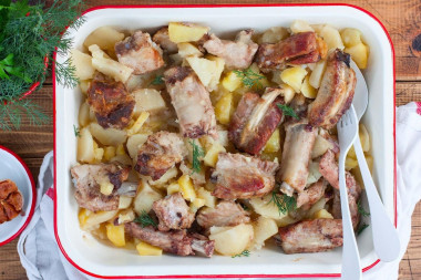 Pork ribs with potatoes in the oven