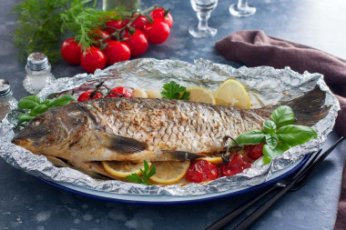 Carp in the oven baked entirely in foil