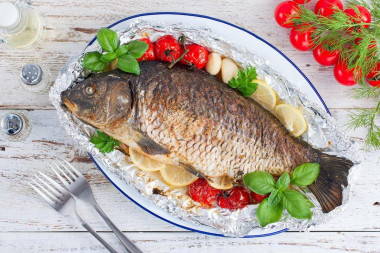 Carp in the oven baked entirely in foil