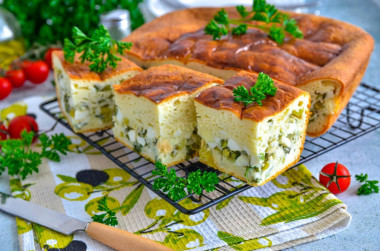 Pie with green onions in the oven