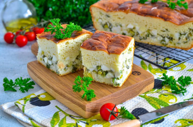 Pie with green onions in the oven