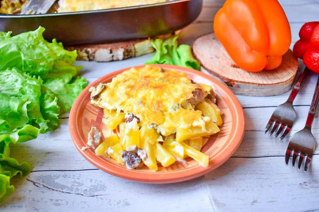 Potato casserole with mushrooms in the oven