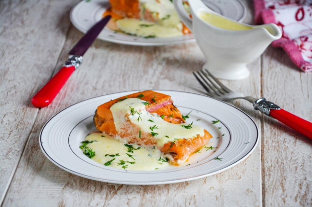 Red fish in cream sauce in the oven