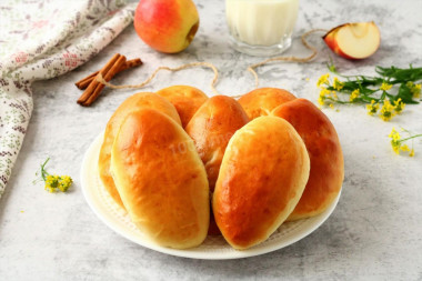 Yeast pastry pies in the oven