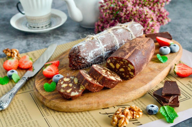 Chocolate sausage with condensed milk from cookies and nuts