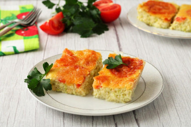 Casserole of zucchini and tomatoes with cheese in the oven