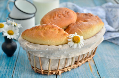 Pies with rice and egg in the oven