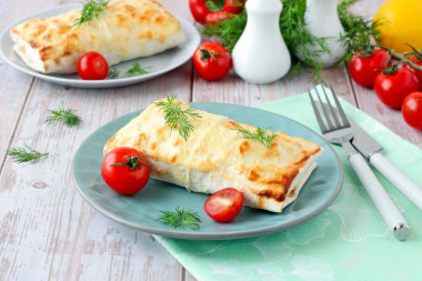 Fish baked in pita bread in the oven