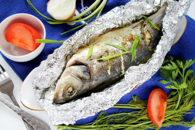 Whole fish baked in the oven in foil