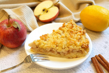 Shortbread pie with apples in the oven