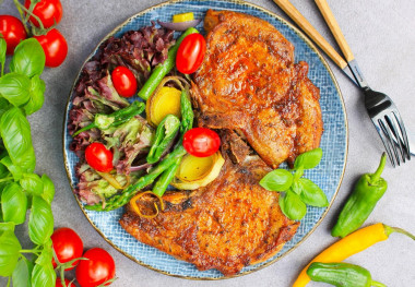 Pork on a baking sheet in the oven