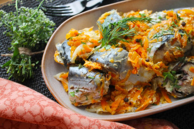 Mackerel in a jar in the oven baked with onions