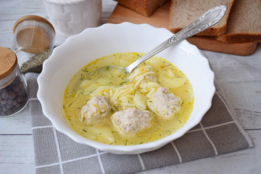 Soup with meatballs and noodles