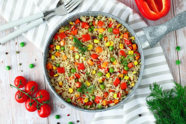 Rice with vegetables in a pan