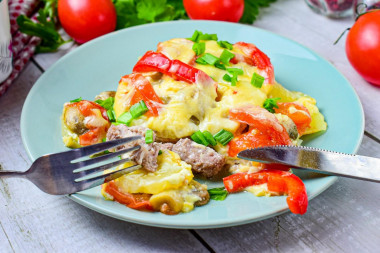 Pork in the oven with tomatoes and potatoes