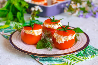 Stuffed tomatoes with cheese in the oven baked