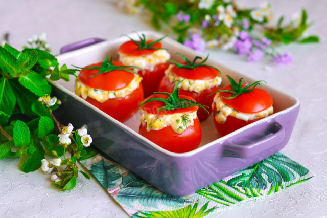 Stuffed tomatoes with cheese in the oven baked