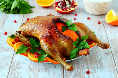 Baked duck with oranges in the oven