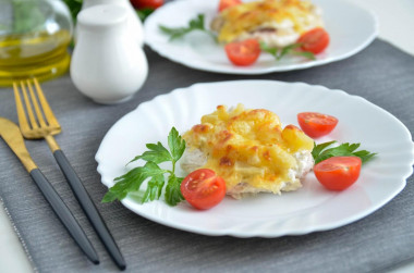 Chicken fillet with pineapples in the oven