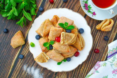 Cottage cheese cookies ears with sugar