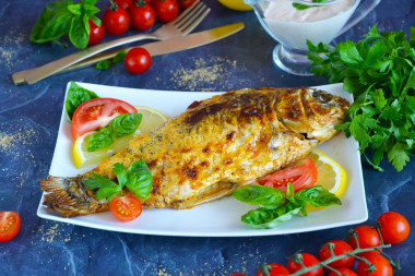 Crucian carp baked in foil in the oven