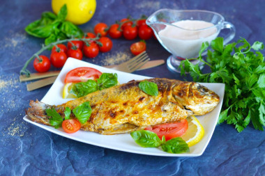 Crucian carp baked in foil in the oven