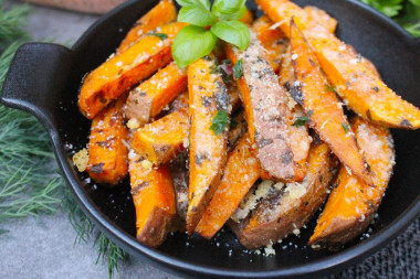 Sweet potato baked in the oven with cheese