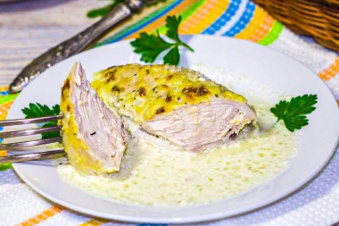 Chicken breast in cream sauce in the oven