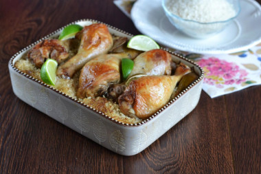 Chicken drumsticks with rice in the oven