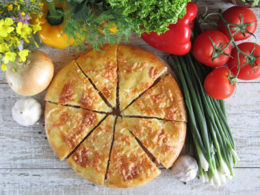 Yeast khachapuri in the oven with cheese